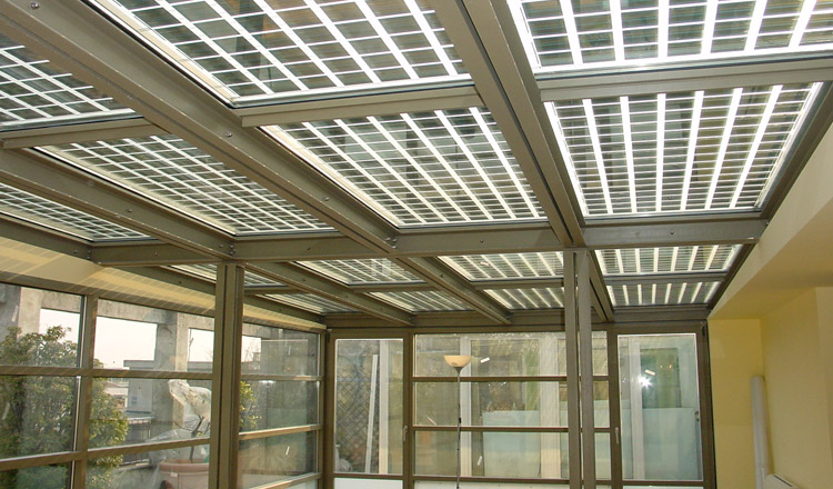 Serra Fotovoltaica: Realizzata a Milano con struttura in acciaio Jansen verniciato e copertura fotovoltaica in vetro Progetto Arch. Muzio